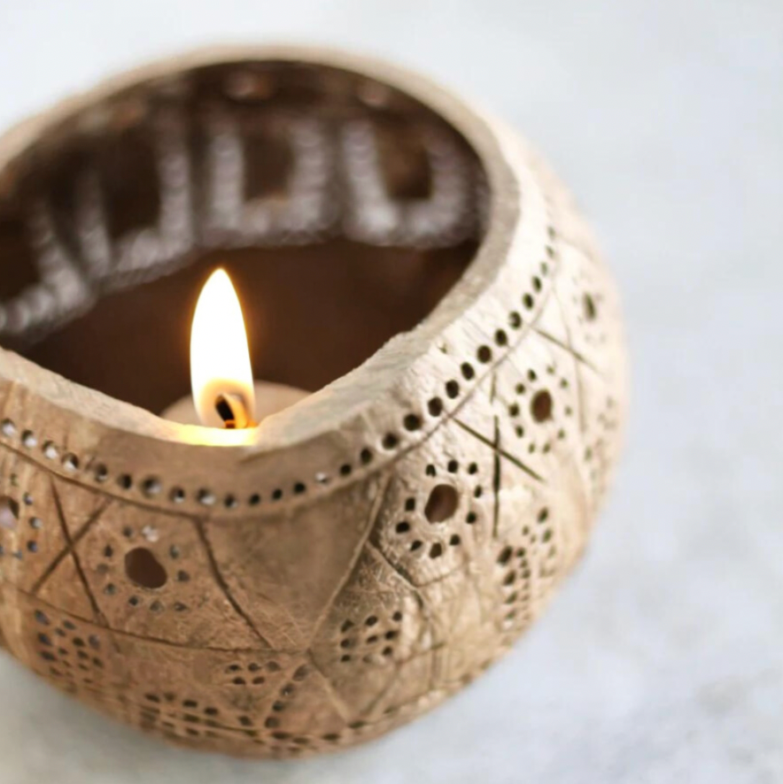 TRIBAL SIEVE COCONUT SHELL TEALIGHT CANDLE HOLDER (prepaid only)